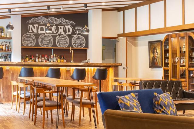 Interior shot of Nomad living room and bar